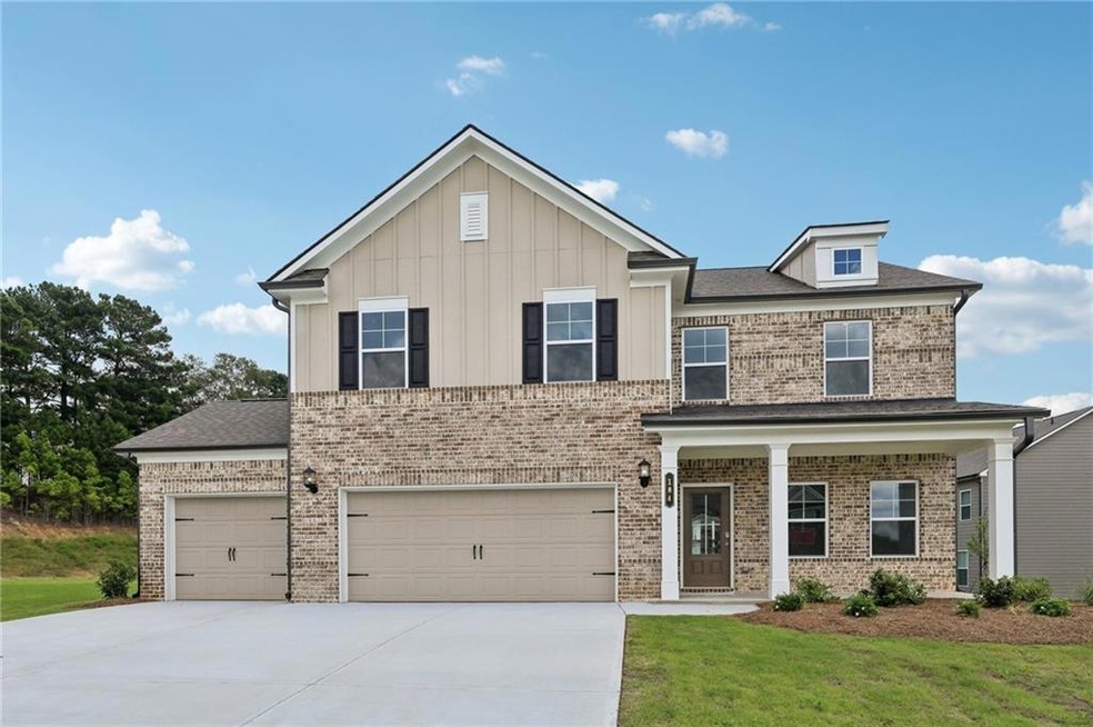 View of front of home featuring a front lawn and a