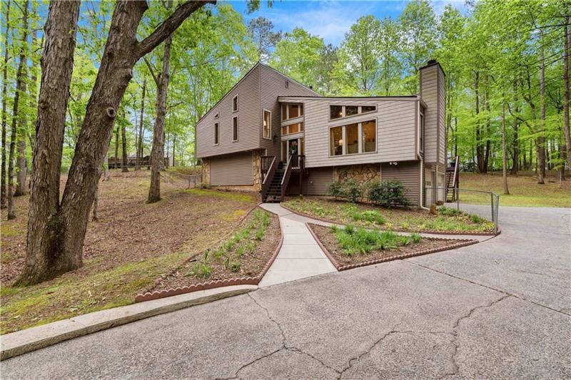 Attractive Contemporary on Large Wooded Lot Boasts