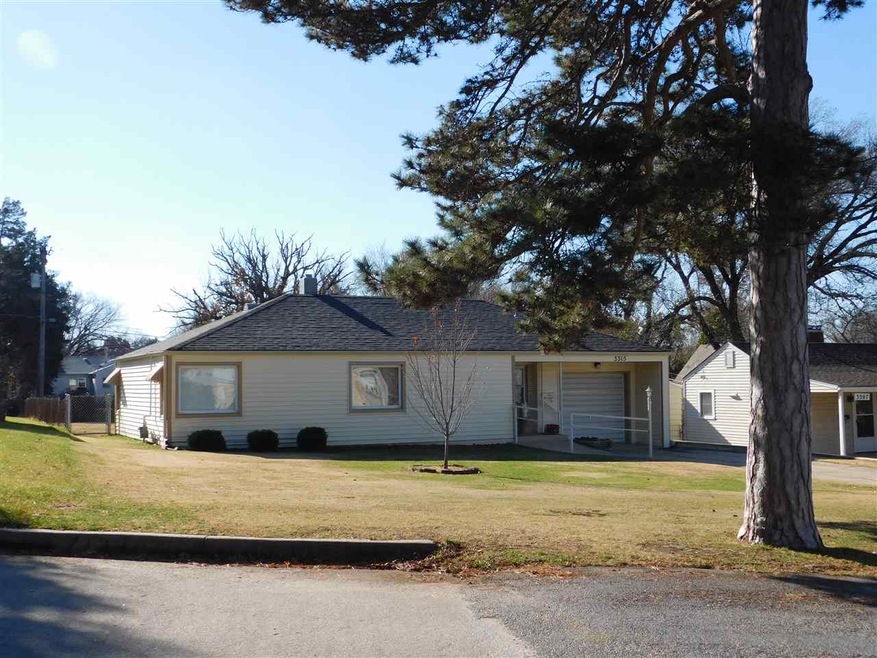 Impressive Curb Appeal with pristine manicured fro