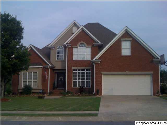 Lovely brick home on lake.