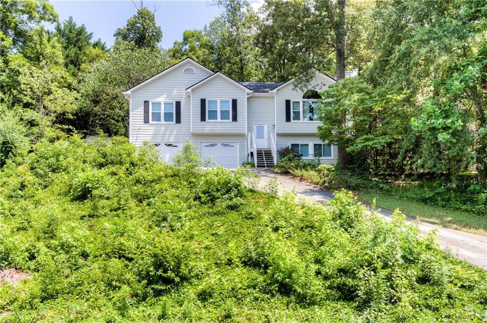 Great raised ranch style home on a beautiful woode