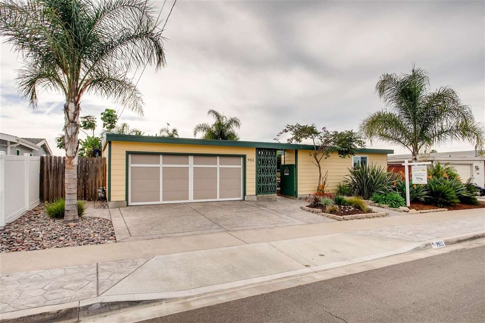 2 Car garage is to the left and a detached enclose