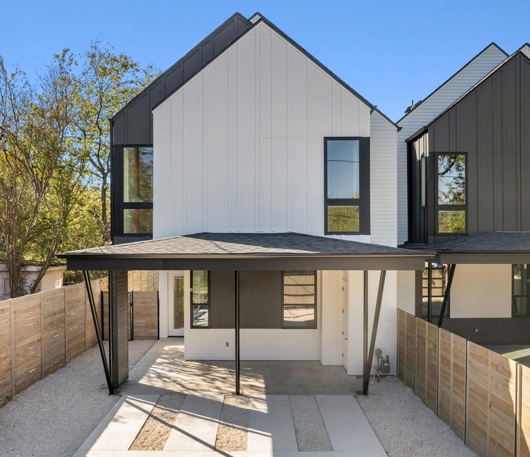 Rear view of property featuring a patio area, fen