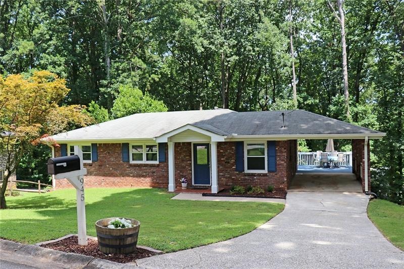 Absolutely charming brick ranch that is ready for 