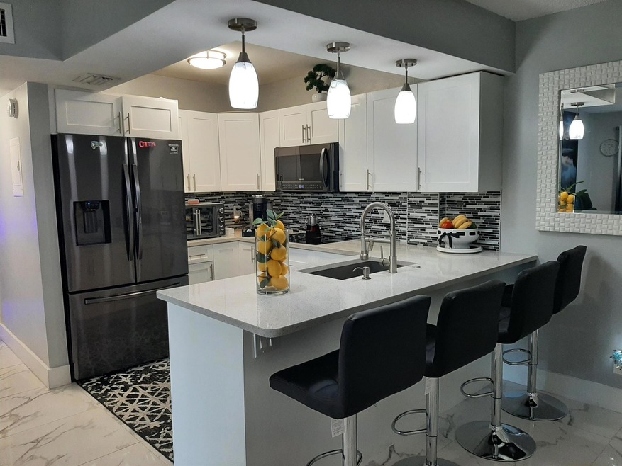 1790 Abbey Rd unit 103B, West Palm Beach, FL 33415 - photo 1