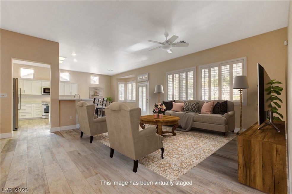 VIRTUAL STAGING OF FAMILY ROOM.