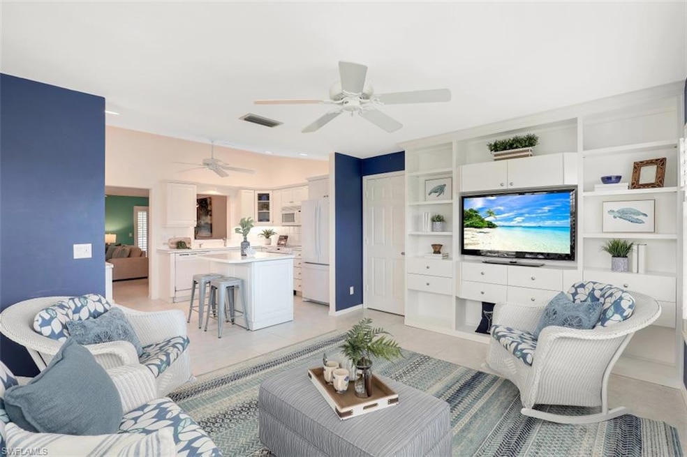 725 Neapolitan Way unit 725, Naples, FL 34103 - photo 1