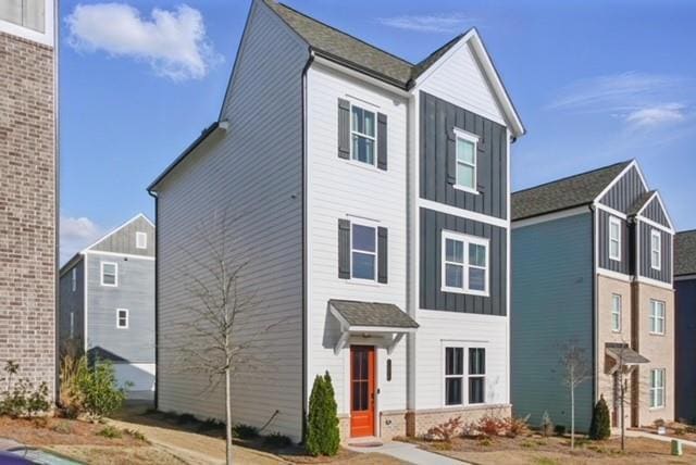 View of front of home featuring board and batten s