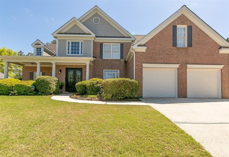 STRIKING 5 BEDROOM, 3 FULL BATH HOME WITH GREAT CU