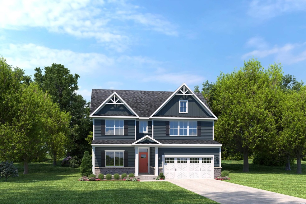 Craftsman-style house featuring a front yard and a