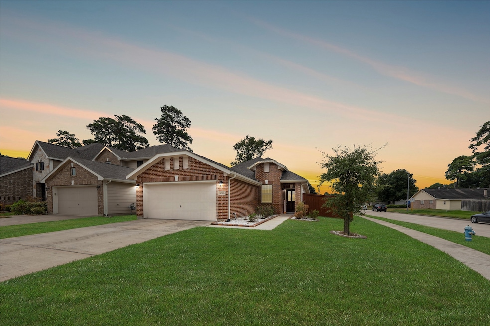 10906 Sun River Falls Dr, Humble, TX 77396 - photo 1