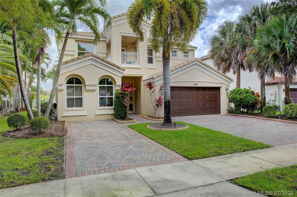6 car driveway plus 2 car garage.