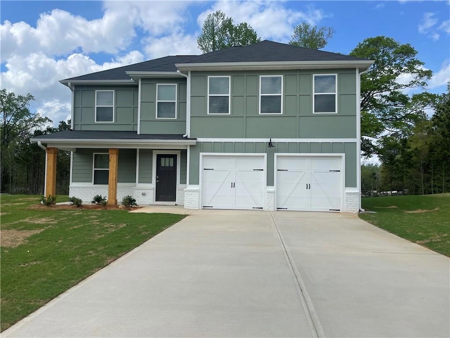 View of front of home featuring an attached garage