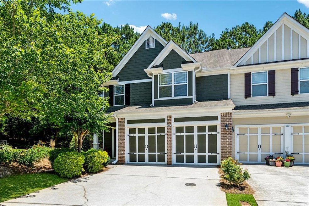 View of front of property with a garage