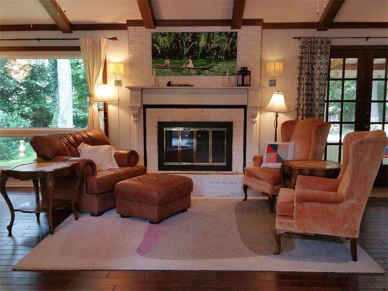 Huge vaulted with beams family room has so much ch