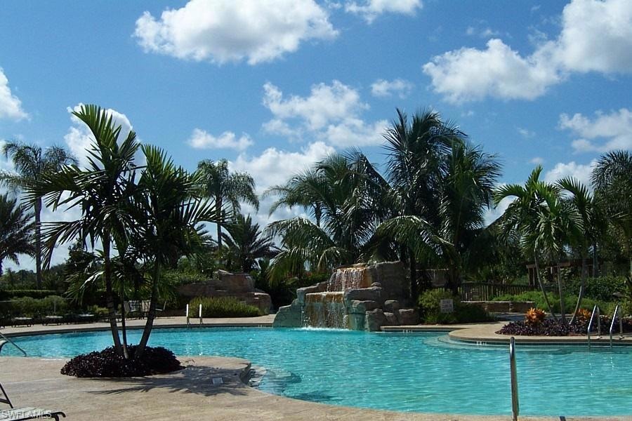 View of pool featuring pool water feature