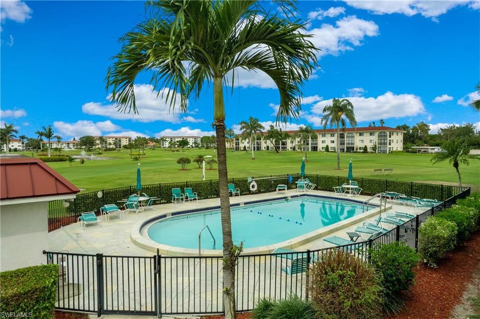 View of pool and golf course