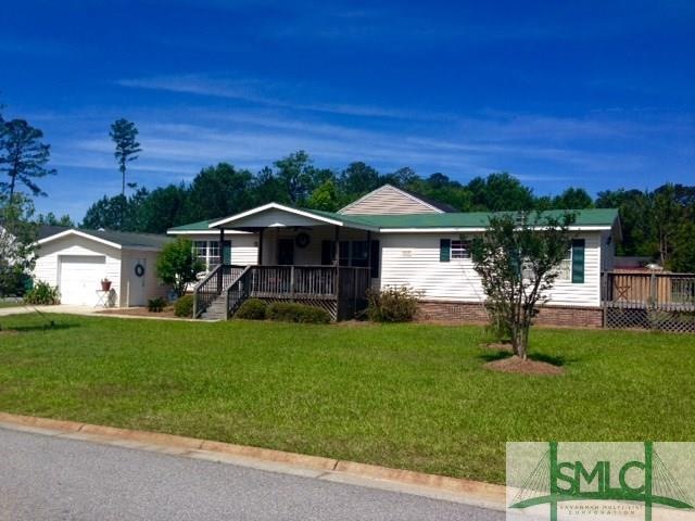 Nice modular home with brick foundation, covered f