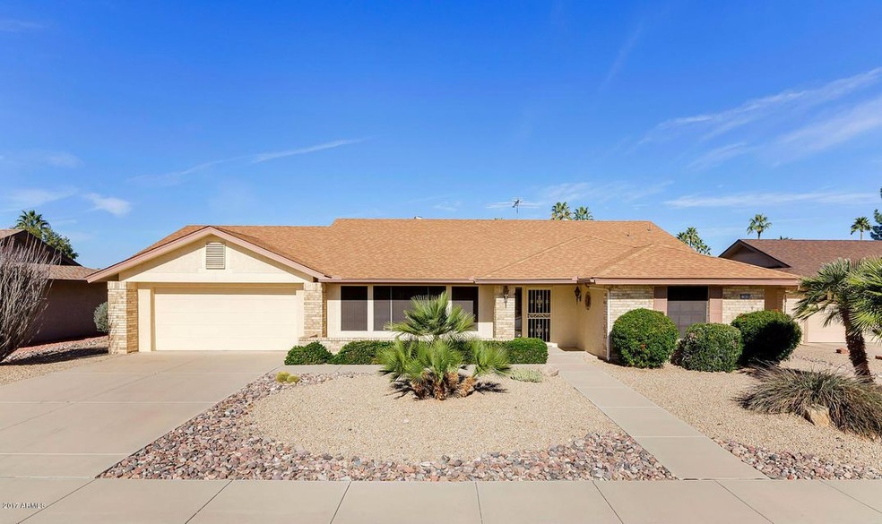 13820 W Elmbrook Dr-large-001-2-Front Ex