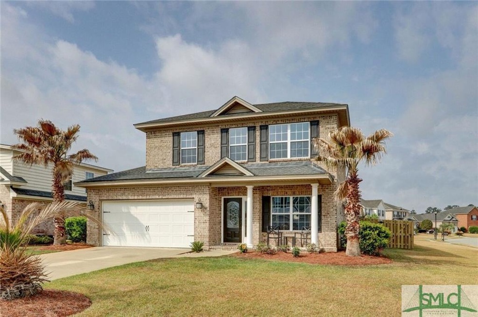 Former builder model home in the sought after comm