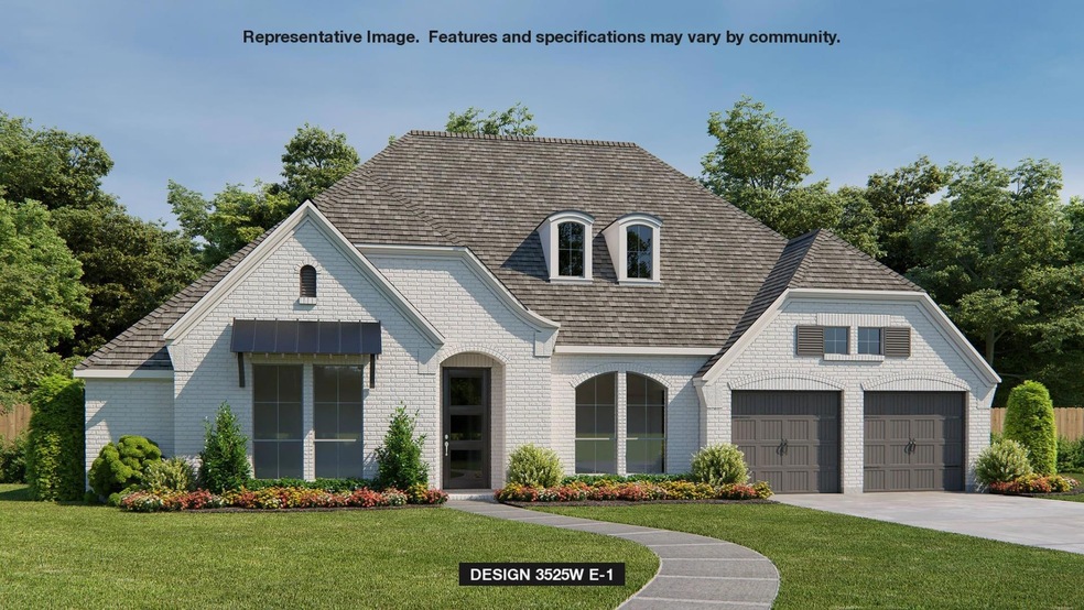 View of front of home featuring a garage and a fro