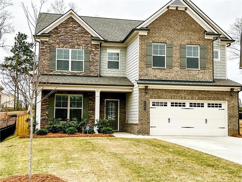 1 year young Craftsman style home perfectly situat