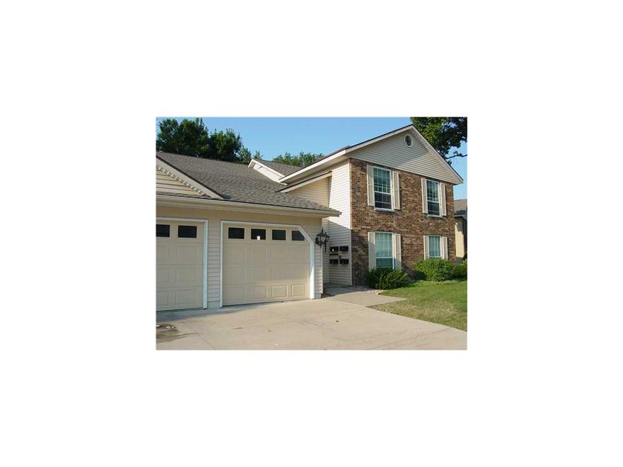 Front Exterior. Classic Brick Front and Larger Gro