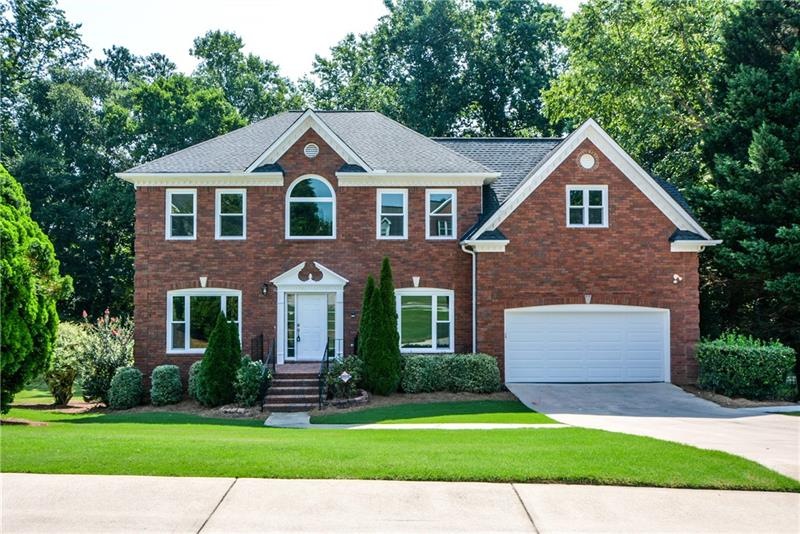 Brick beauty in Johns Creek; New windows sparkle i