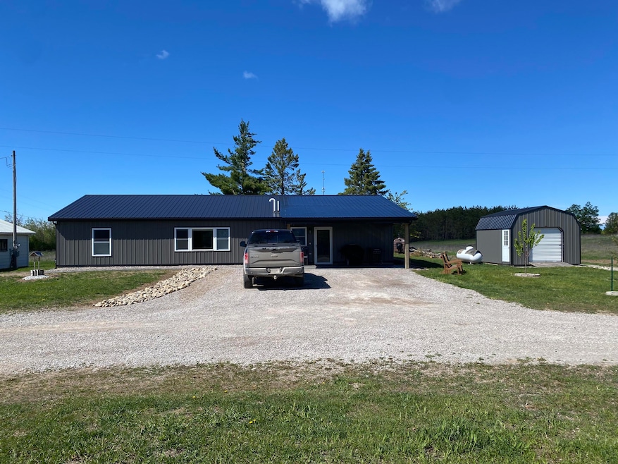 7557 Loop Rd, Posen, MI 49776 - photo 1