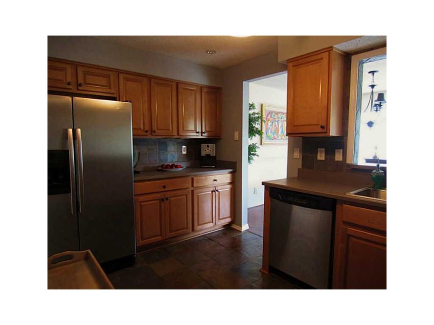 Kitchen. Gourmet kitchen features new stainless ap