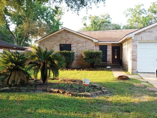 7230 Winding Trace Dr, Houston, TX 77086 - photo 1