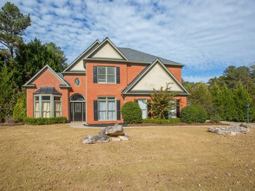 EAST COBB EXECUTIVE ESTATE WITH 3 SIDED BRICK EXTE