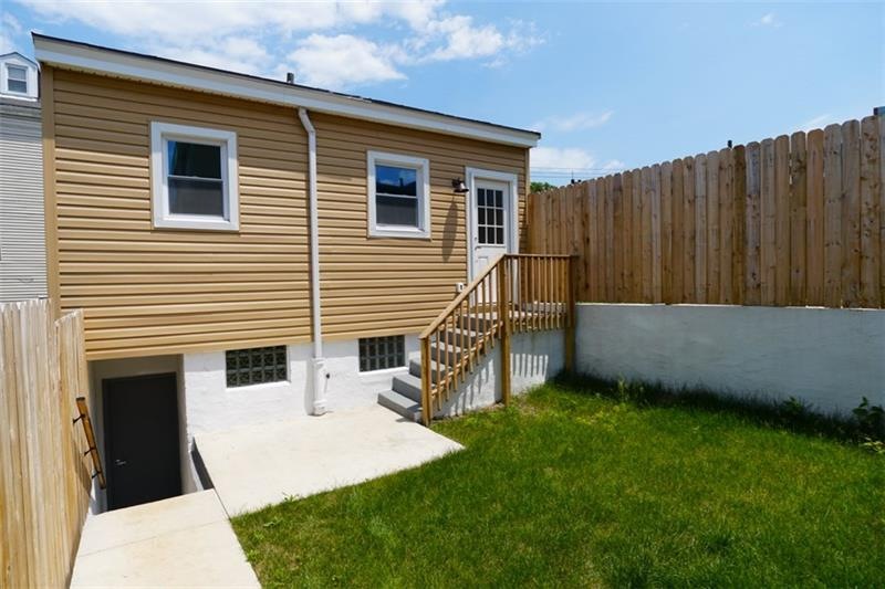 The private yard is great for entertaining and is 