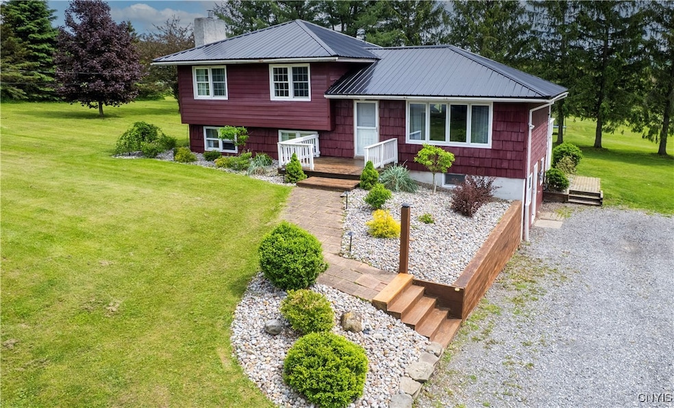 Beautiful landscaping in the front and over to the