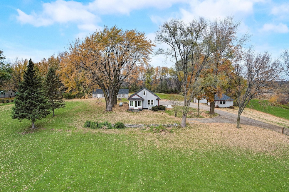 This delightful 1.5-story home retains the charm of the 1930s while offering modern updates for comfortable living.