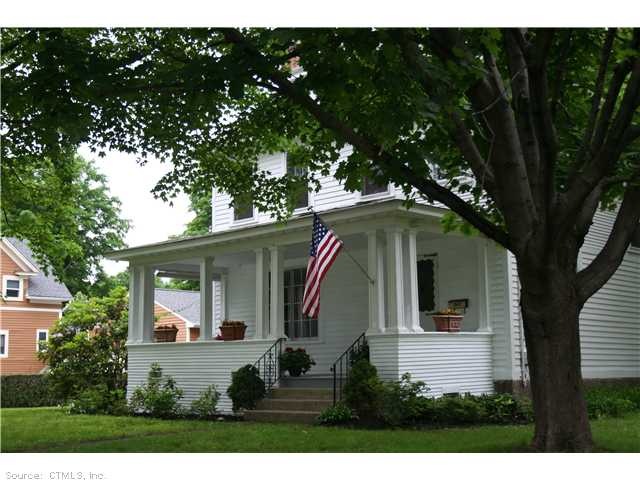 Exterior Front. Very inviting home, located on a c