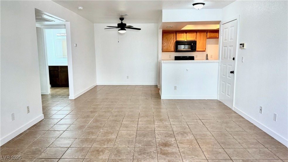Unfurnished living room with light tile patterned