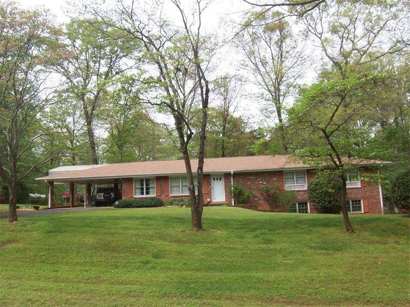 4-sided brick ranch with low maintenance vinyl eav