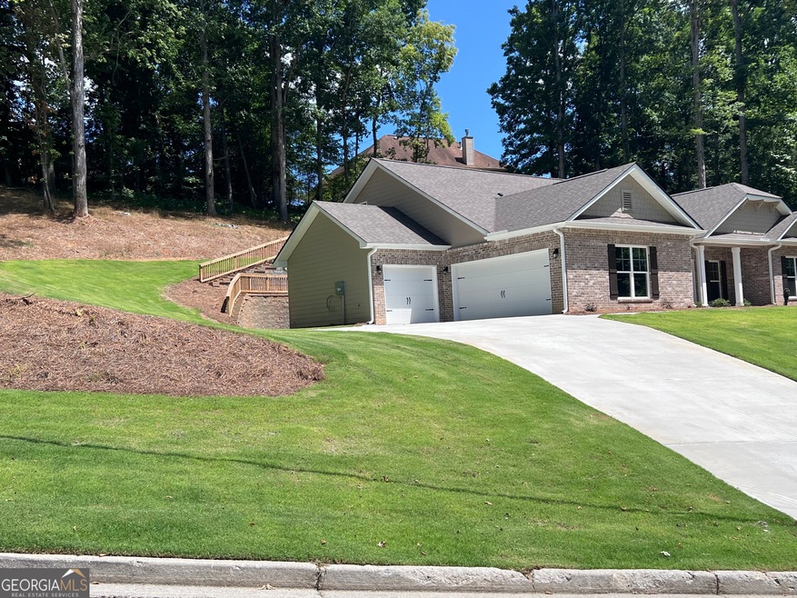 BEATIFUL FRONT YARD /LONG DRIVEWAY & 3 CAR GARAGE