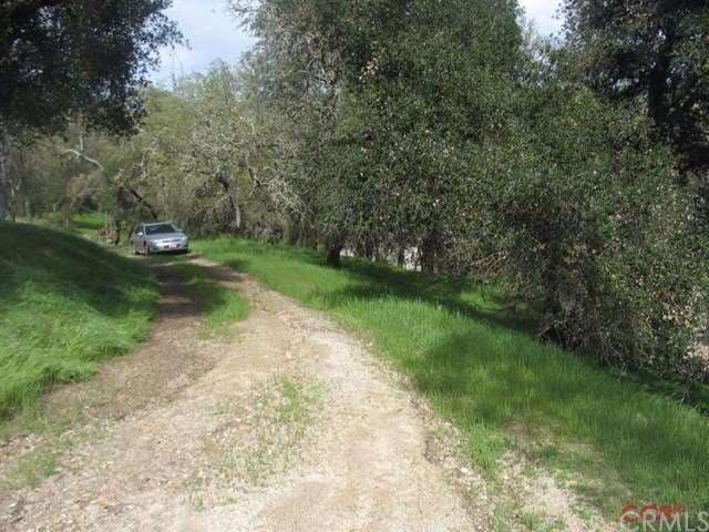 Top of the lot...  down hill from the dirt road.