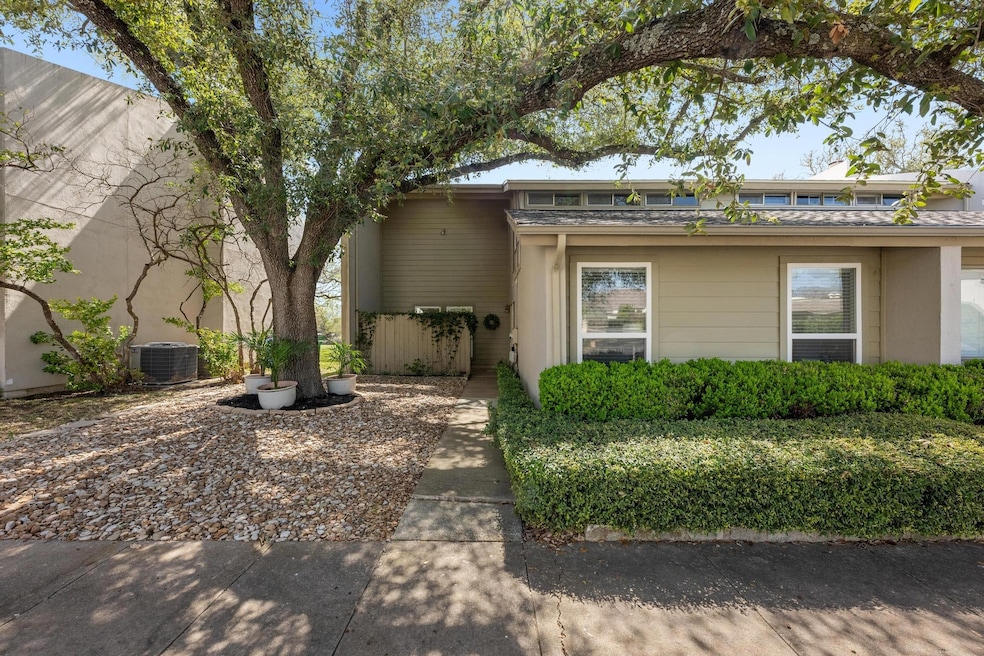 View of front of house featuring stucco siding an