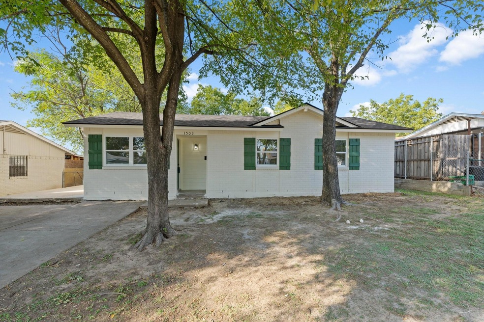 View of front of house with a patio area