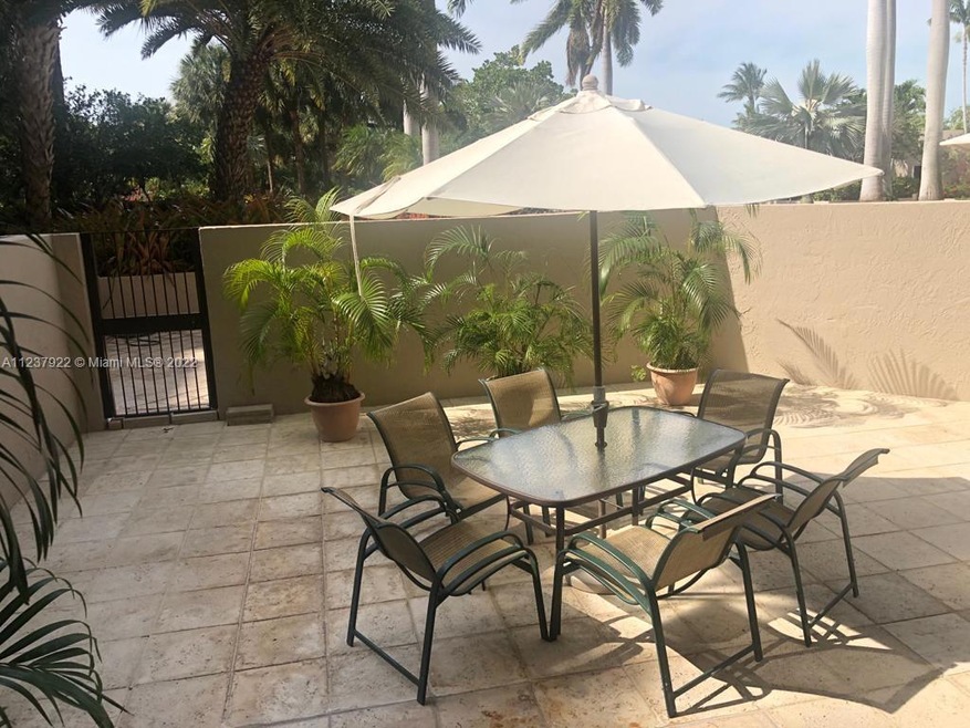 Huge terrace with gate to pool and beach access facing most desirable south side 
