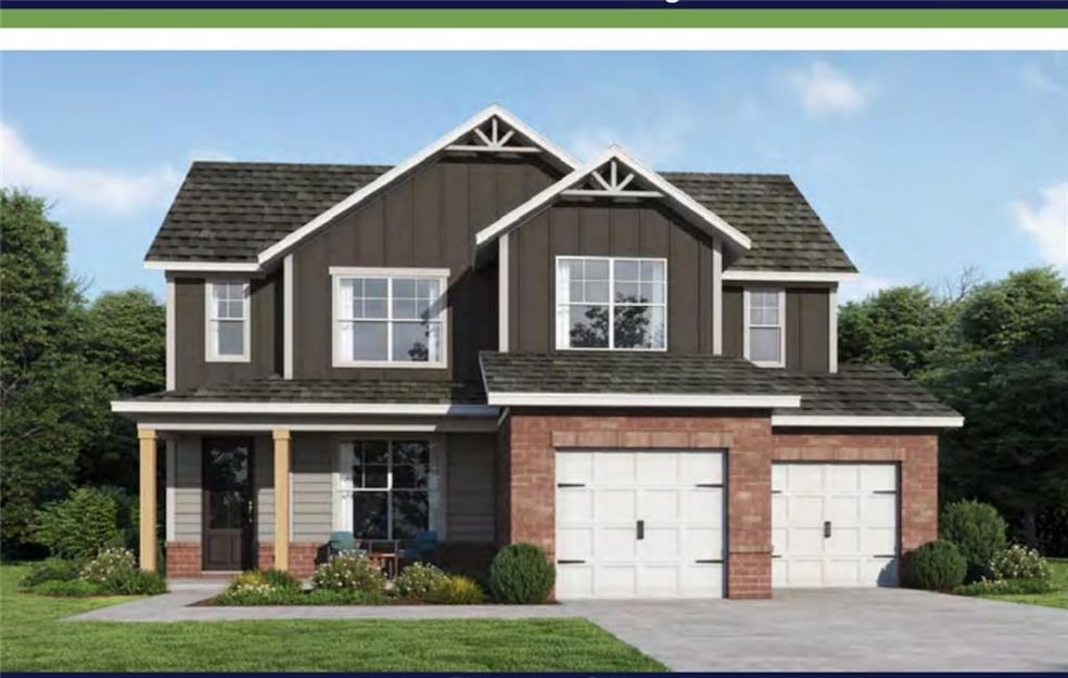 Craftsman inspired home with brick siding, concret