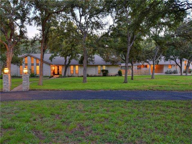 Over 150 huge, healthy oaks surround this beautifu