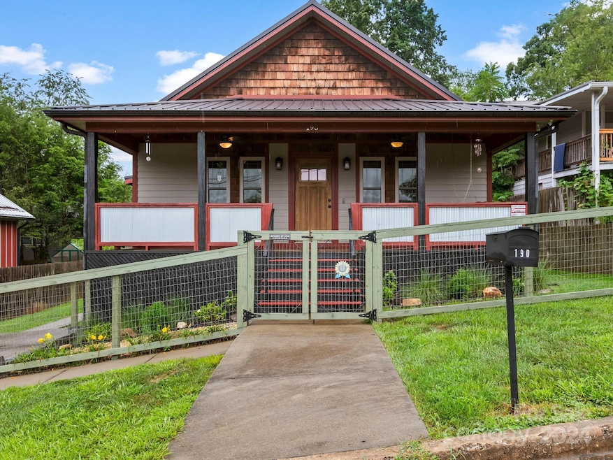 partially fenced in front & side yard