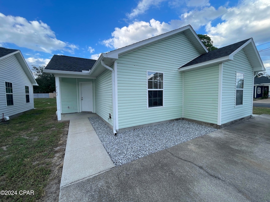 7102 N Lagoon Dr, Panama City, FL 32408 - photo 1