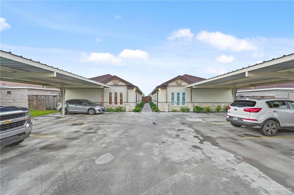 View of parking featuring a carport