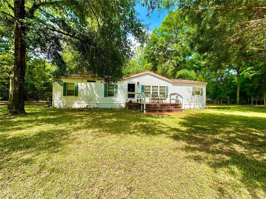 2884 SW Wilson Springs Rd, Fort White, FL 32038 - photo 1