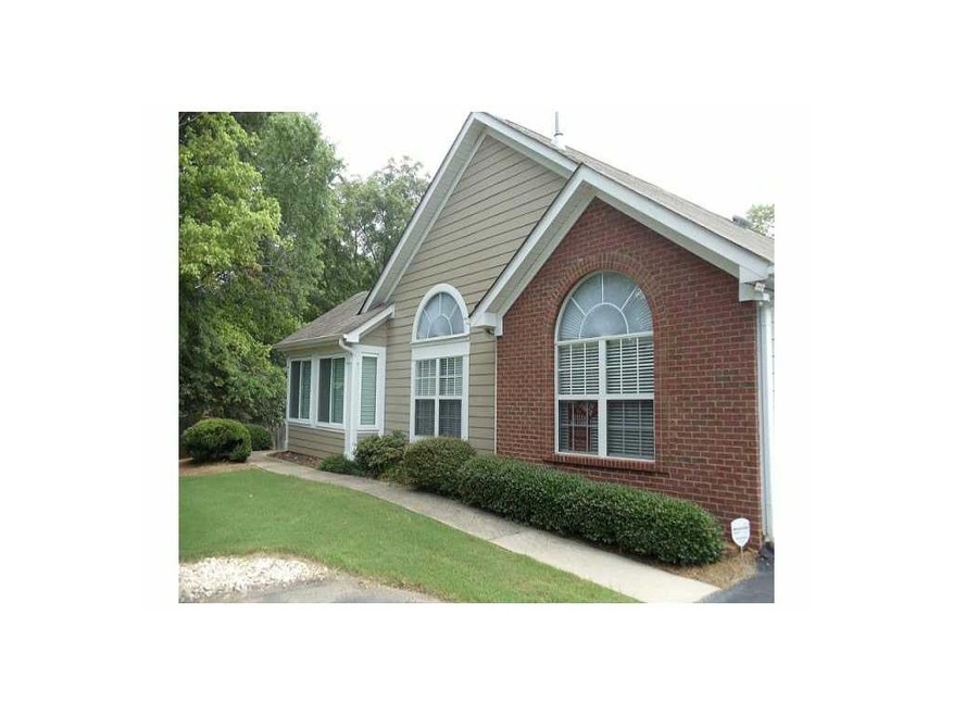 Exterior Front. Charming stepless ranch end unit w